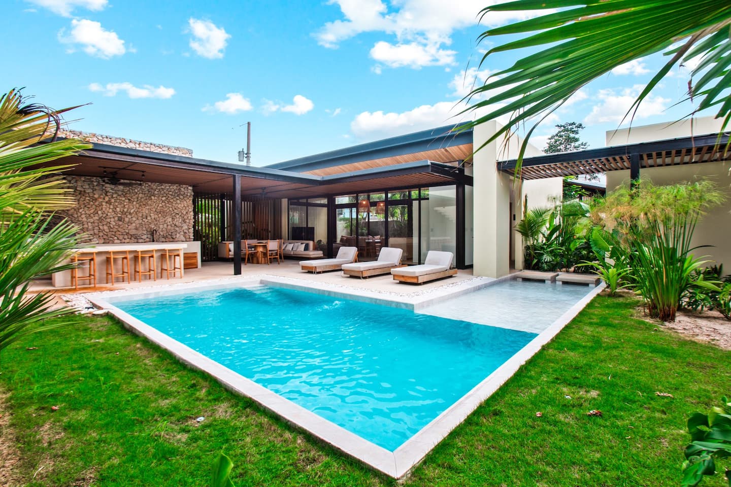 Modern pool courtyard at Playa Grande Luxe Villa